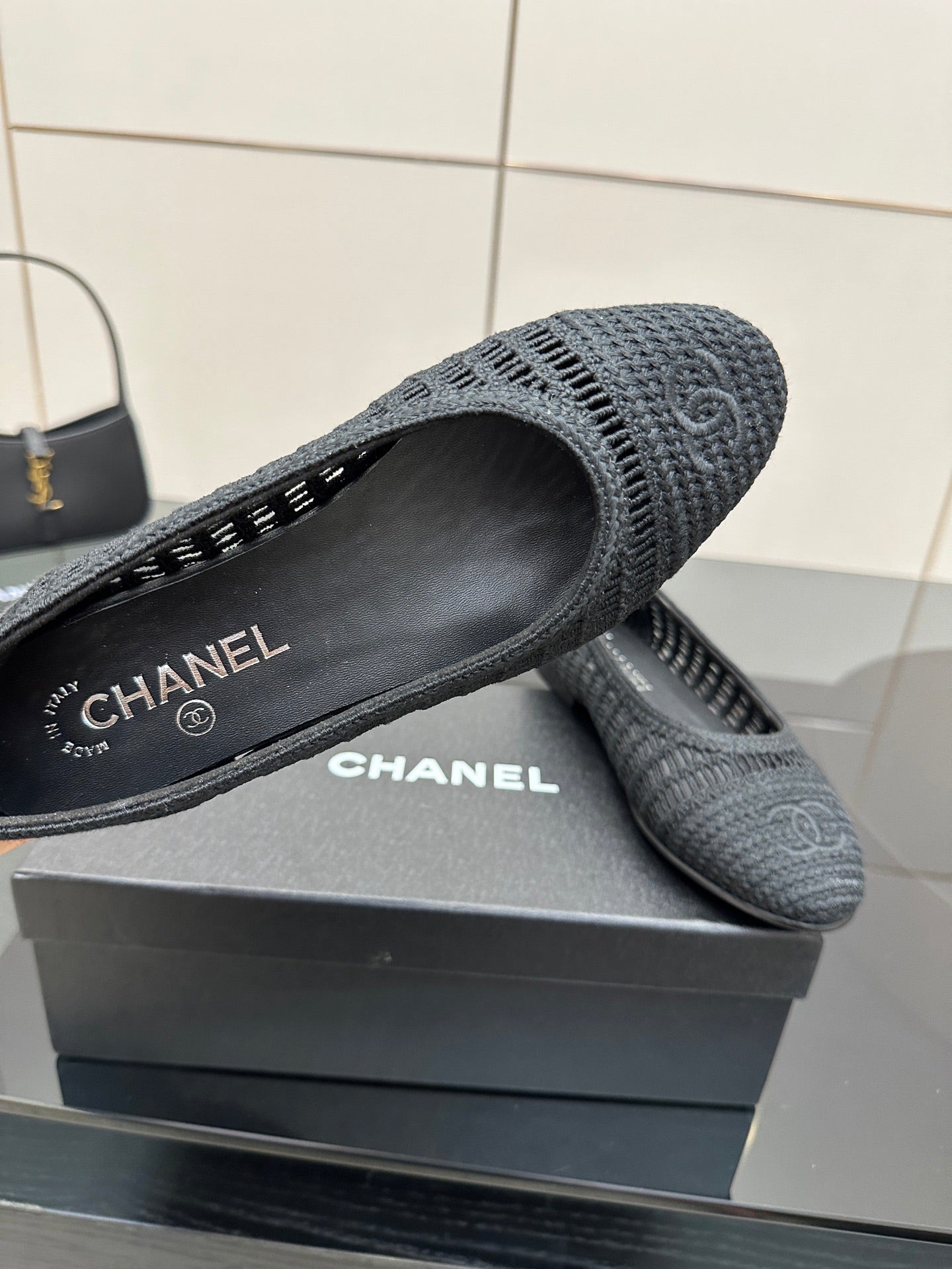 Women’s Chanel dark gray knit flat with CHANEL logo on insole, round toe