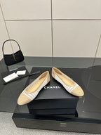 Chanel ladies woven ballet flats, angled side view, cream with white striped trim
