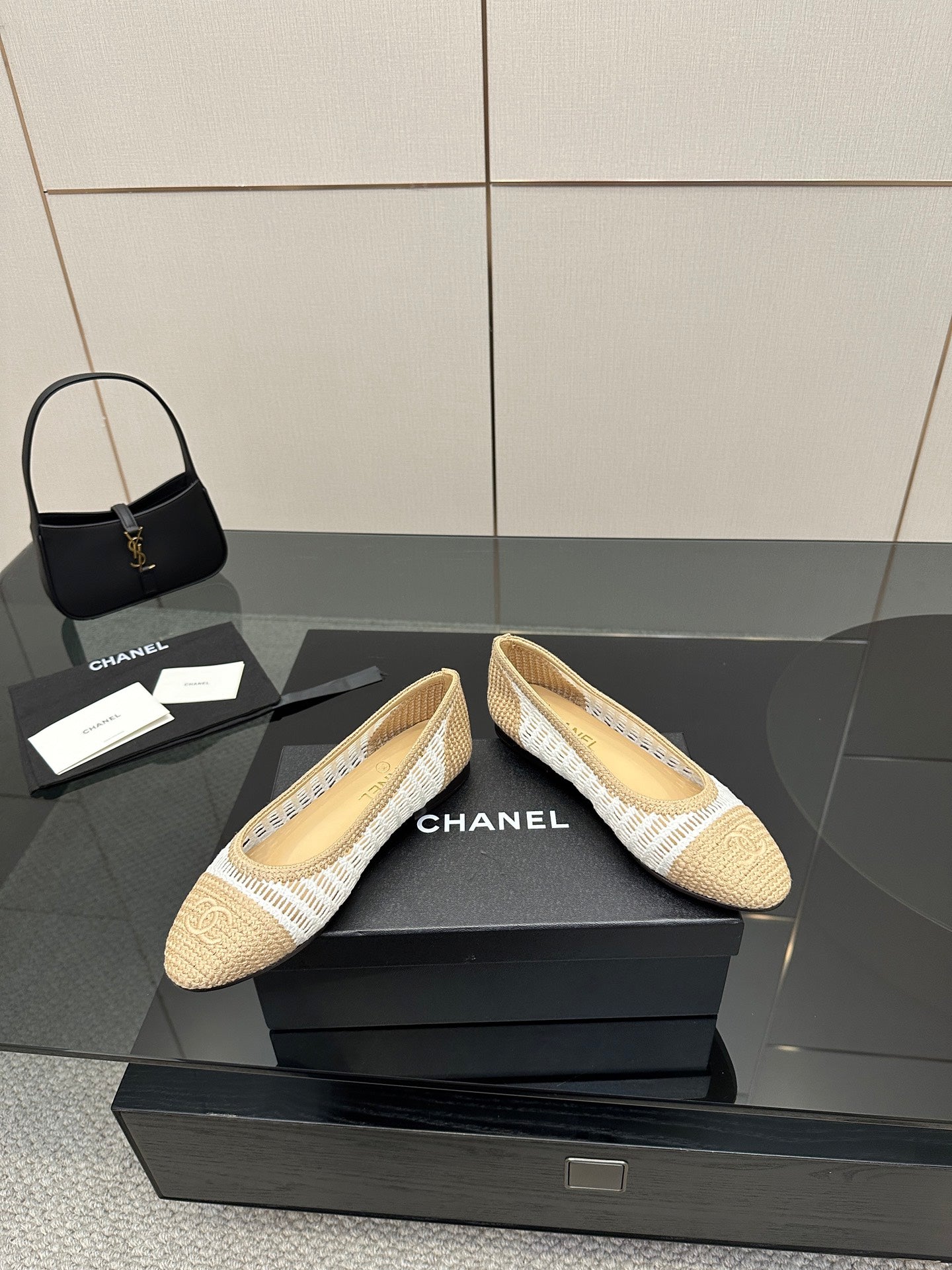 Chanel ladies woven ballet flats, angled side view, cream with white striped trim