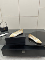 Chanel ladies woven ballet flats, side-by-side angle, cream with white stripe trim
