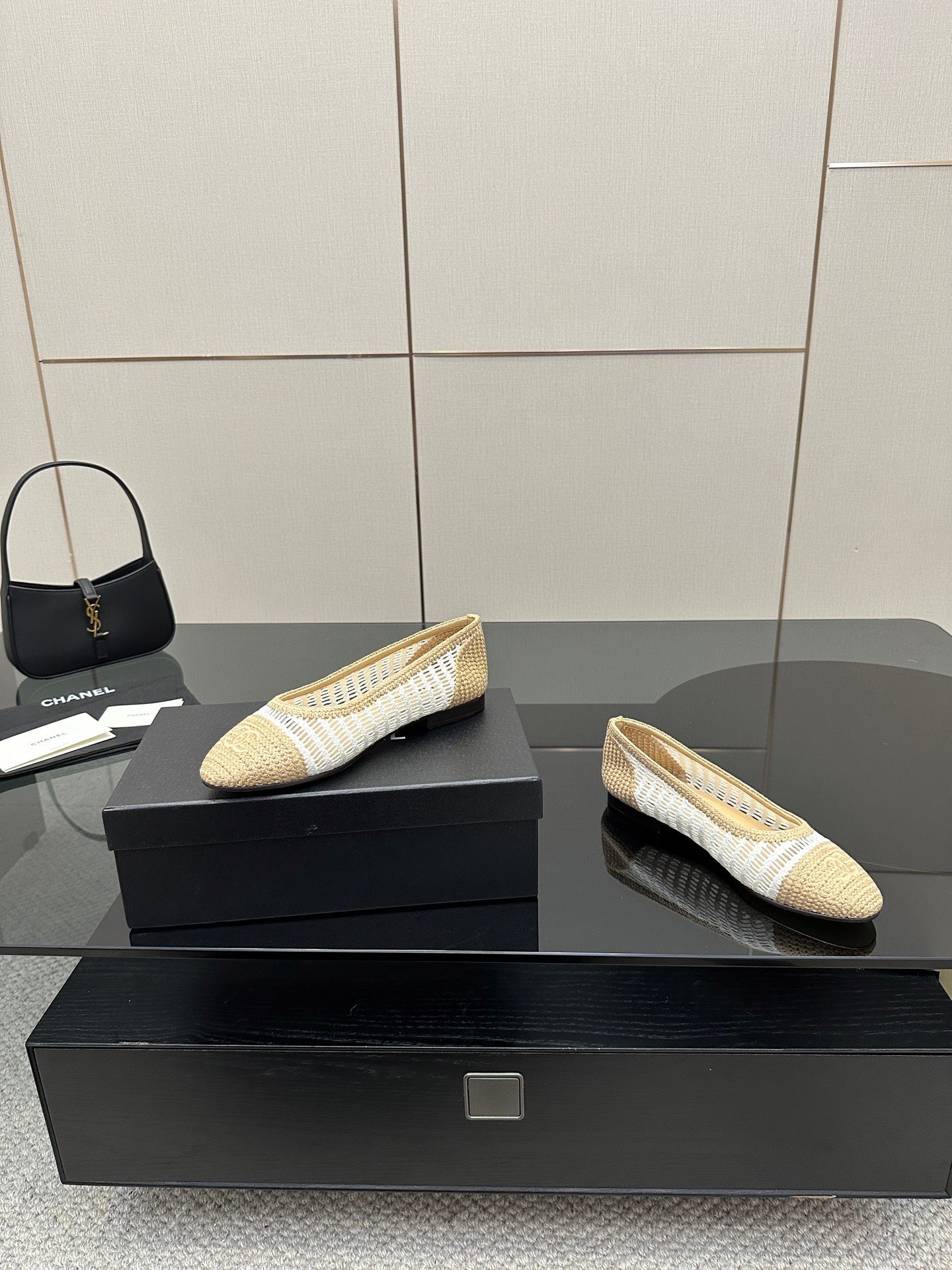Chanel ladies woven ballet flats, side-by-side angle, cream with white stripe trim