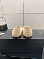 Chanel ladies woven ballet flats, rear view of heels, cream with white trim