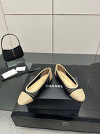 Chanel ladies ballet flats, slip-on beige and navy knit with stitched trim around edge