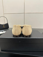 Chanel ladies ballet flats, rear view of beige knit flats with flat low heel