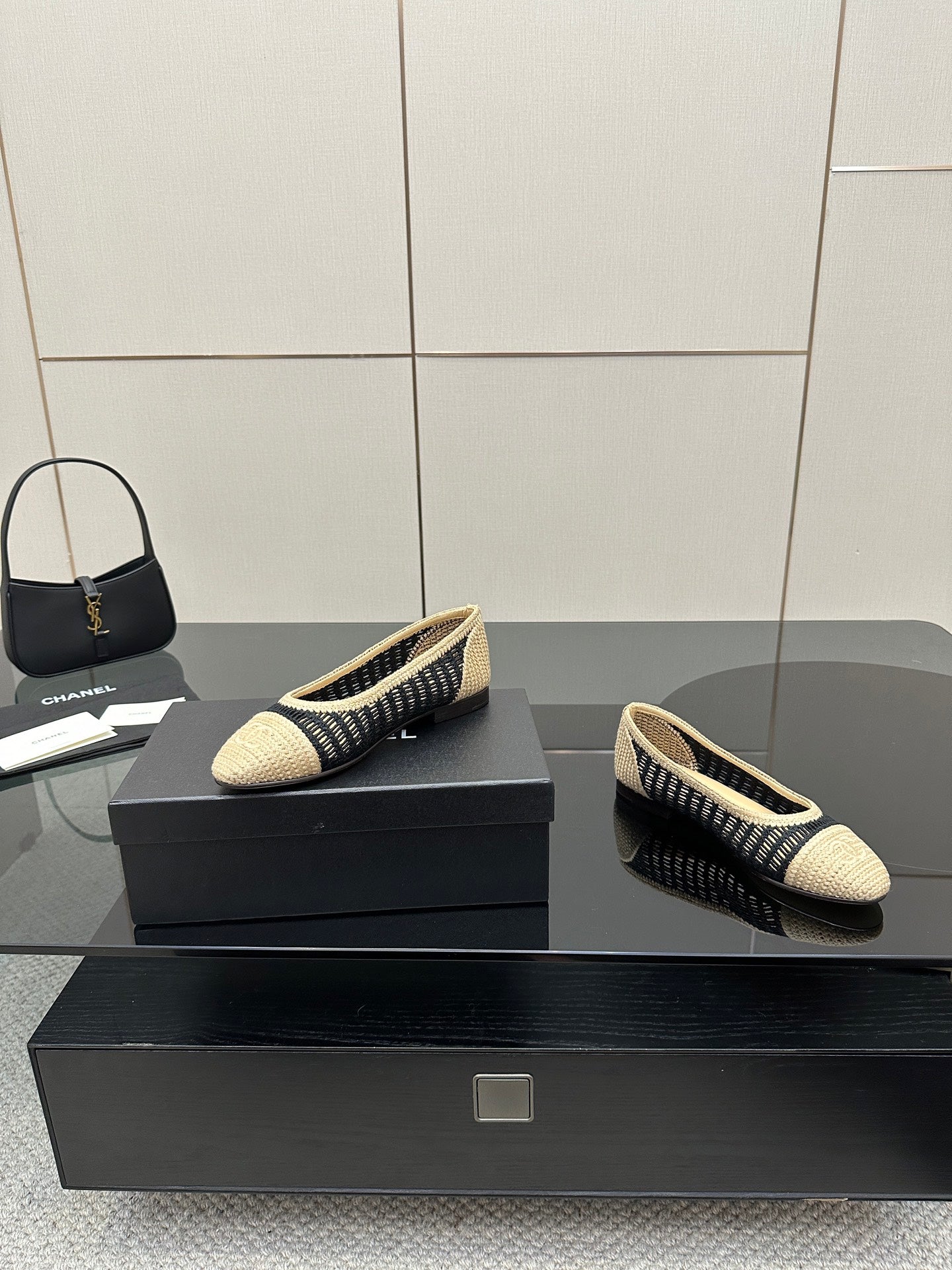 Chanel ladies ballet flats, front and side views in beige knit with navy trim stripe