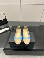 Chanel ladies slip-on flats with woven blue and beige fabric, rounded toe