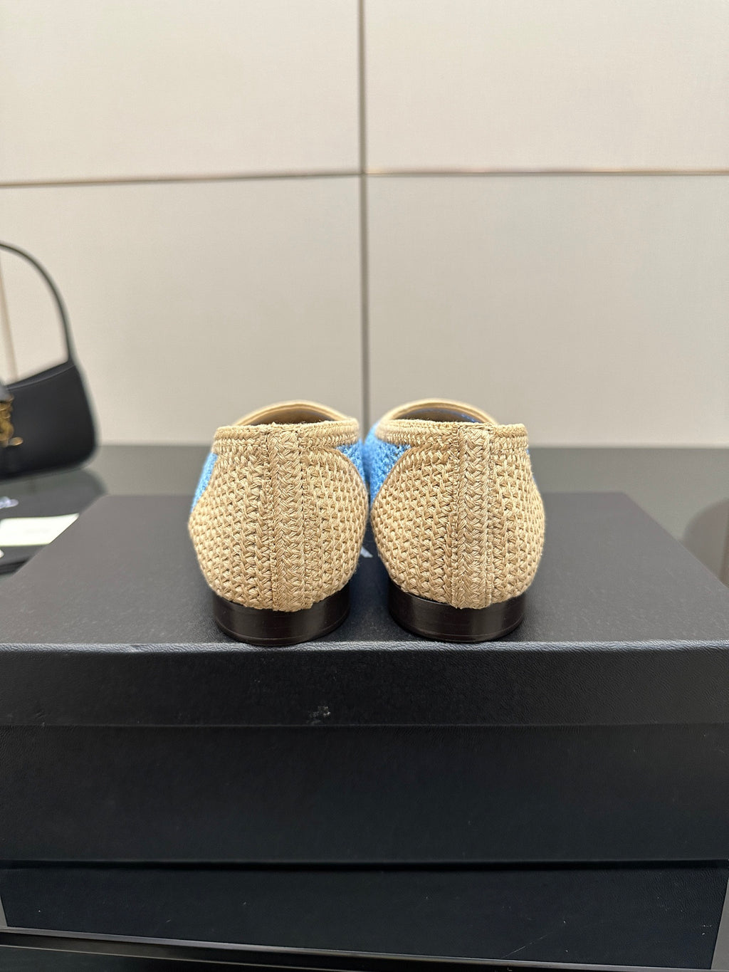 Chanel ladies woven flats rear view, beige knit with blue trim at heel