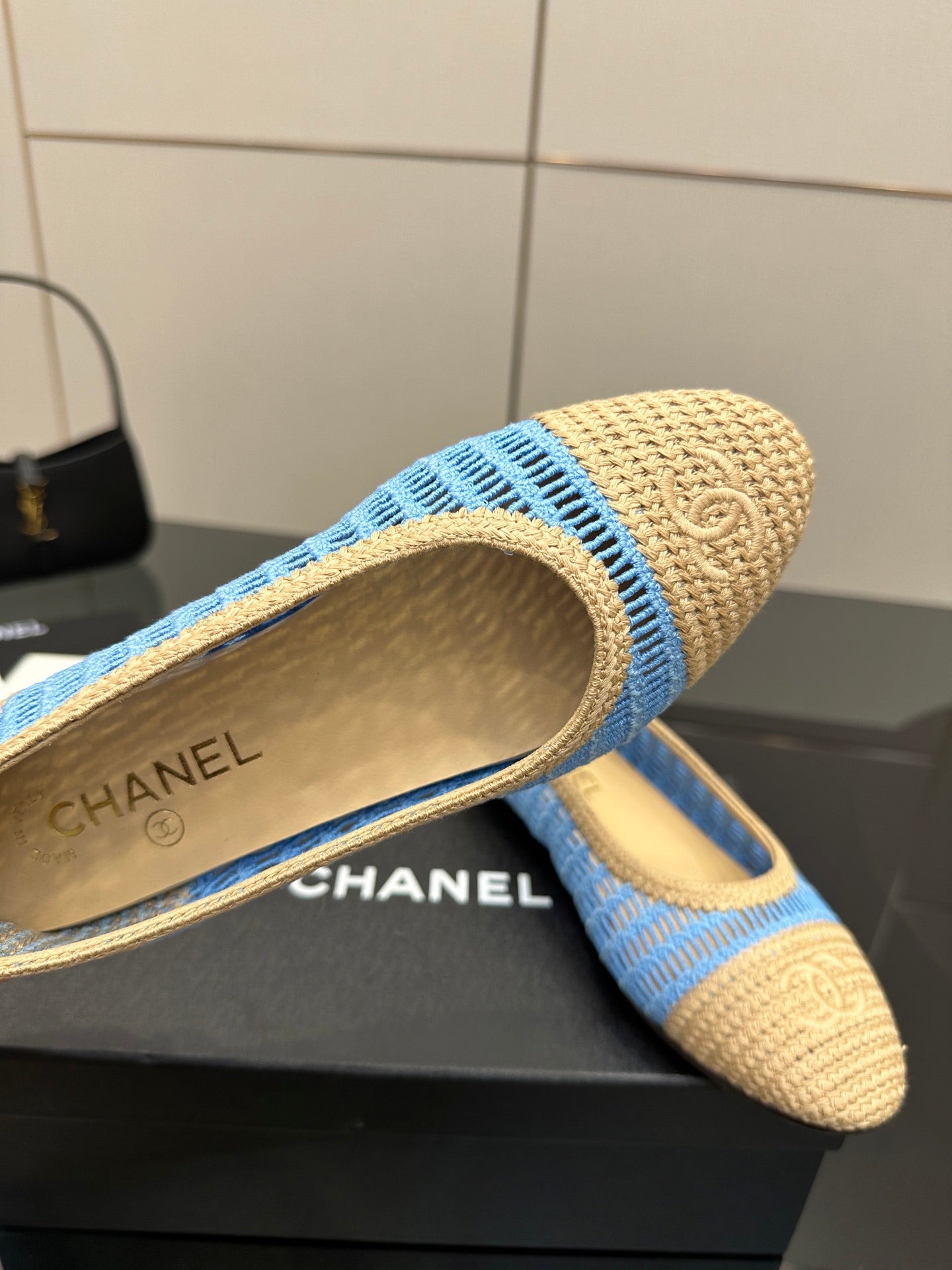 Chanel ladies woven flat close-up, CHANEL insole lettering on beige lining
