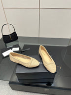 Chanel women’s slip-on flats, light beige woven knit upper and low profile sole