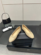 Chanel women’s woven slip-on flats with pointed toe, light beige texture and low heel