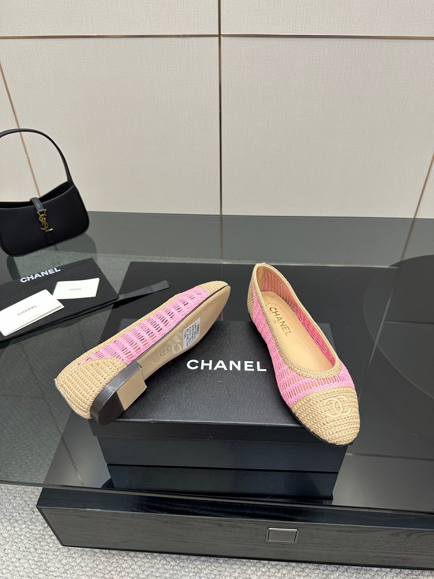 Women's Chanel ballet flats, beige crochet with pink trim, on display box