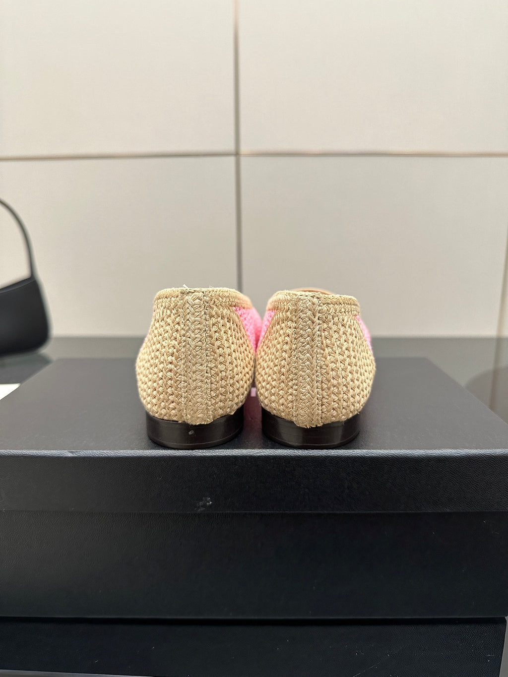 Women's Chanel ballet flats, beige woven backs with low heels, rear view