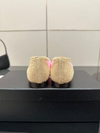 Women's Chanel ballet flats, beige woven backs with low heels, rear view
