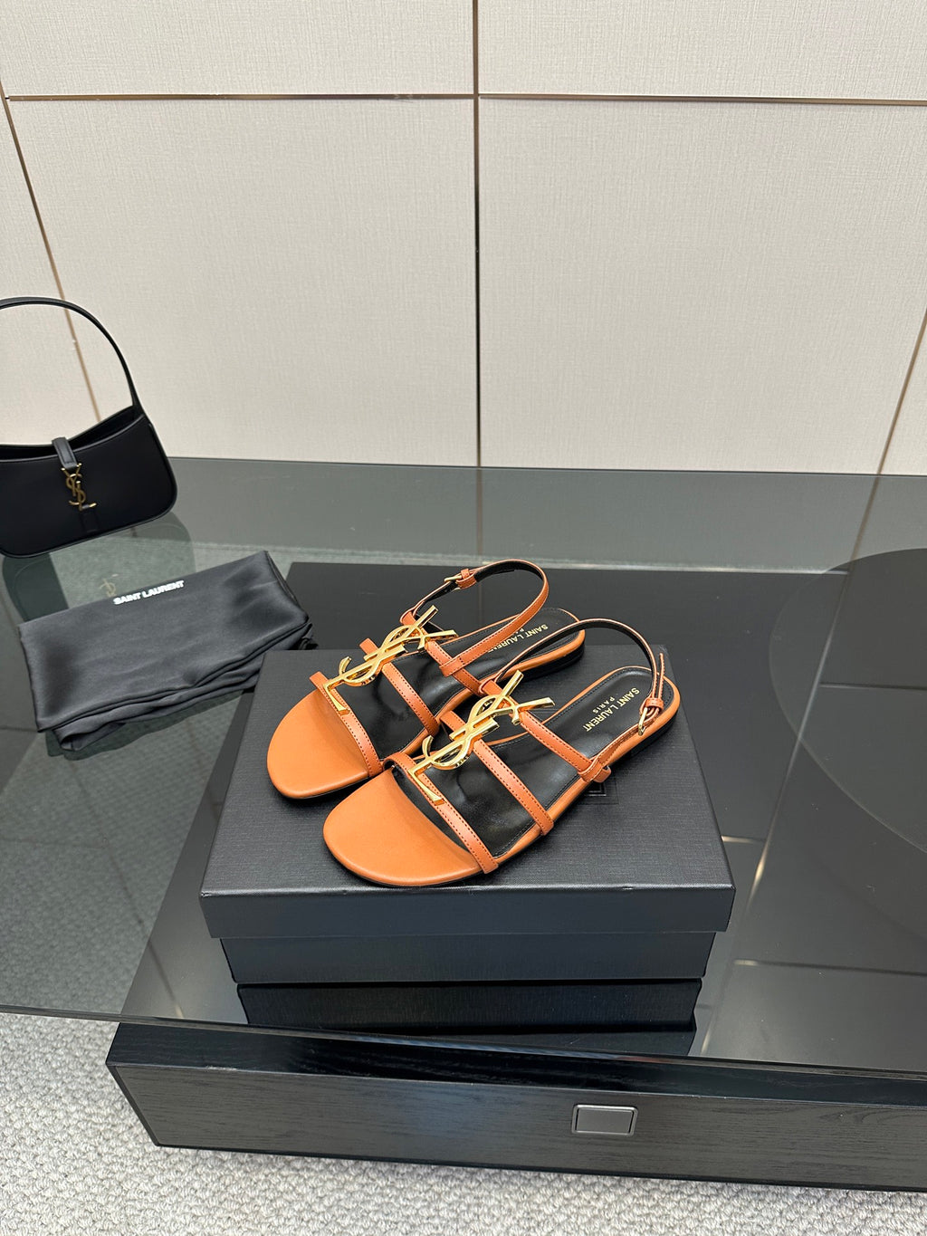 Women's strappy slide sandals, orange leather-look with black straps and gold-tone trim