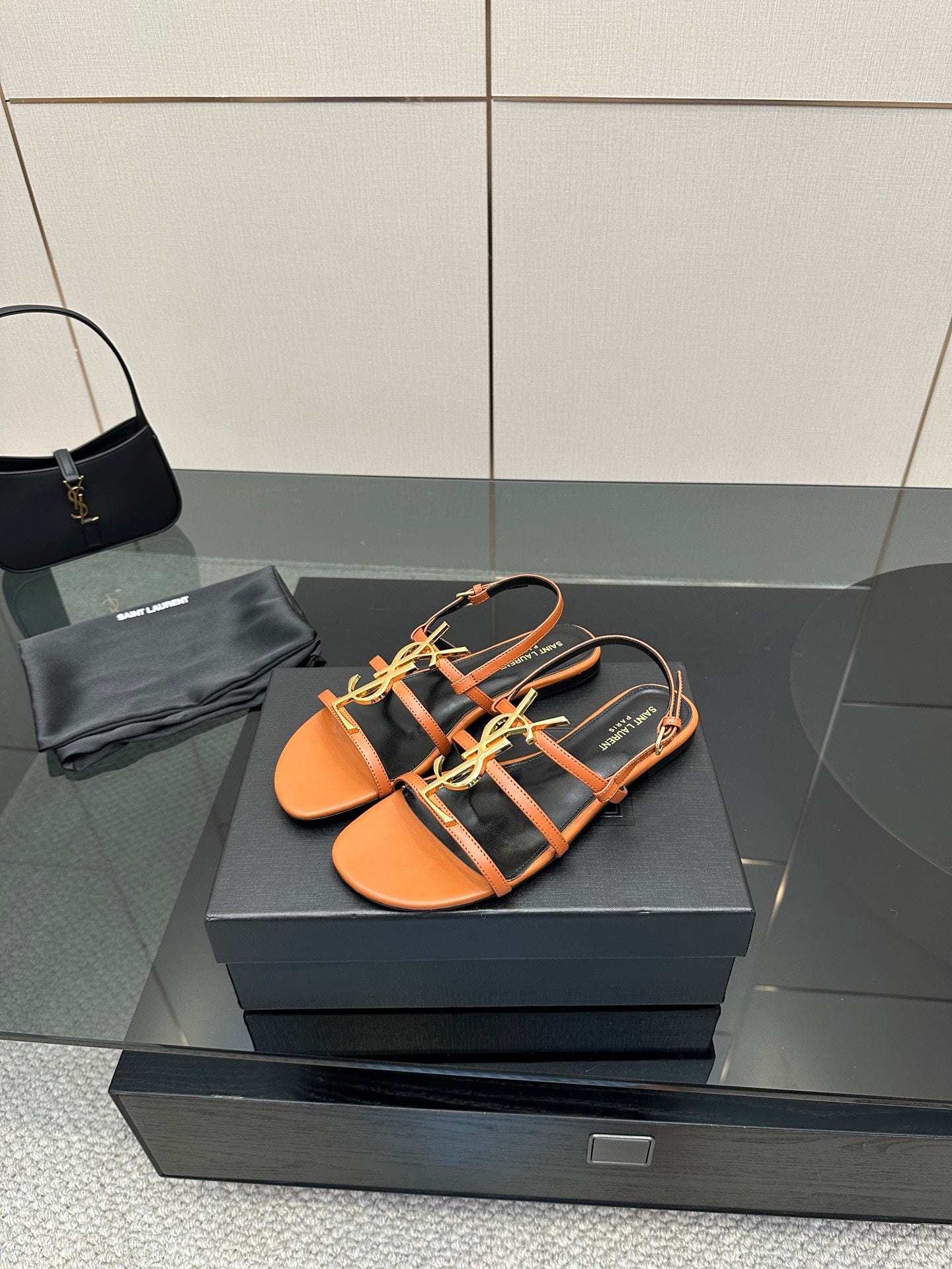 Women's strappy slide sandals, orange leather-look with black straps and gold-tone trim