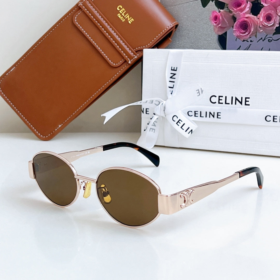 Celine sunglasses with light frame and round brown lenses, with black temple tips