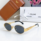 Celine sunglasses with gold frame and round dark blue lenses, with black temples