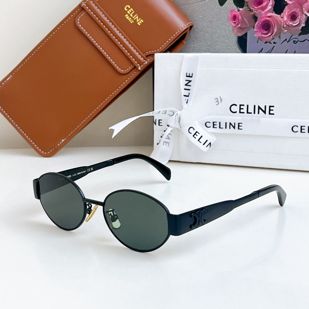 Celine sunglasses with black frame and round dark green lenses, with sleek temples