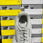 Light gray unisex running sneaker tongue and laces detail with padded heel collar