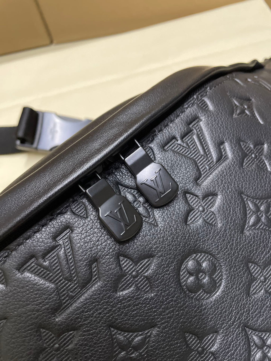 Men’s Louis Vuitton dark navy monogram belt bag close-up of strap and logo details