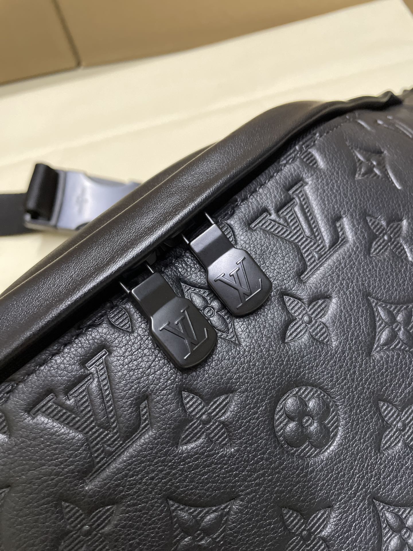 Men’s Louis Vuitton dark navy monogram belt bag close-up of strap and logo details