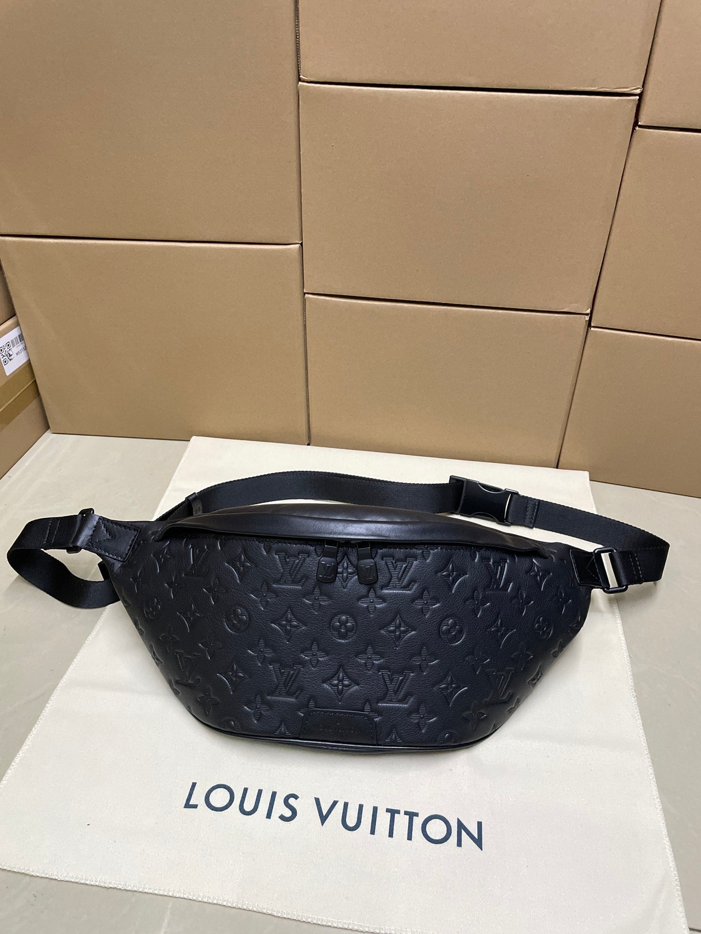 Men’s Louis Vuitton monogram belt bag in dark navy with adjustable shoulder strap