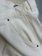 Prada off-white cargo pants with front patch pockets and angled stitched seams