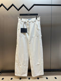 Off-white wide-leg cargo pants with button fly and belt loops