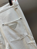 Off-white cargo pants with stitched flap pocket and metal button