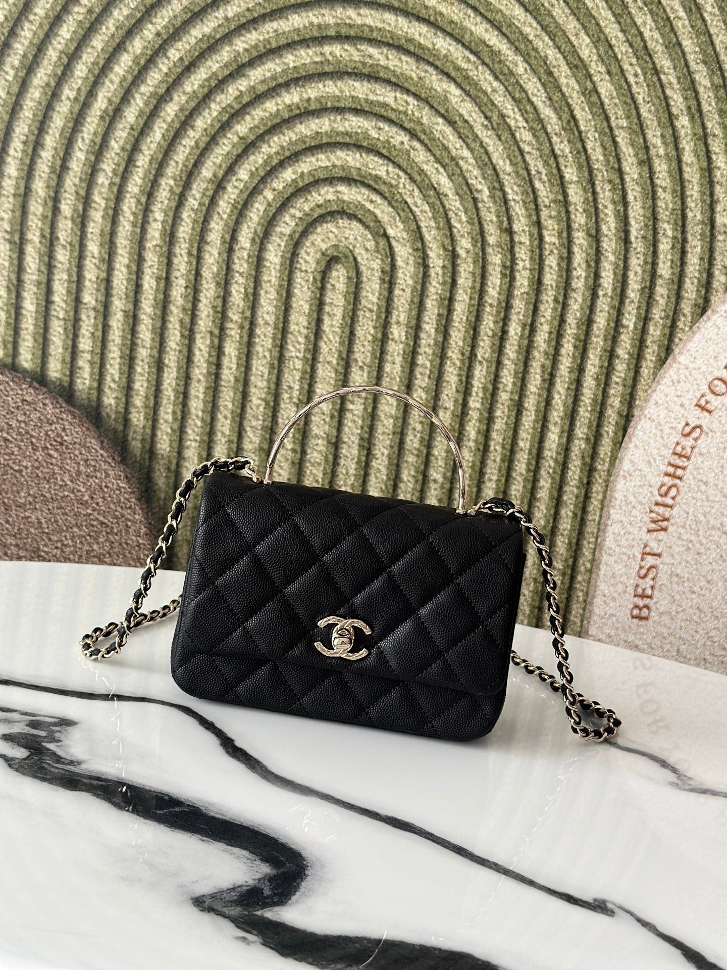 Chanel bag, black quilted leather, chain strap and small top handle