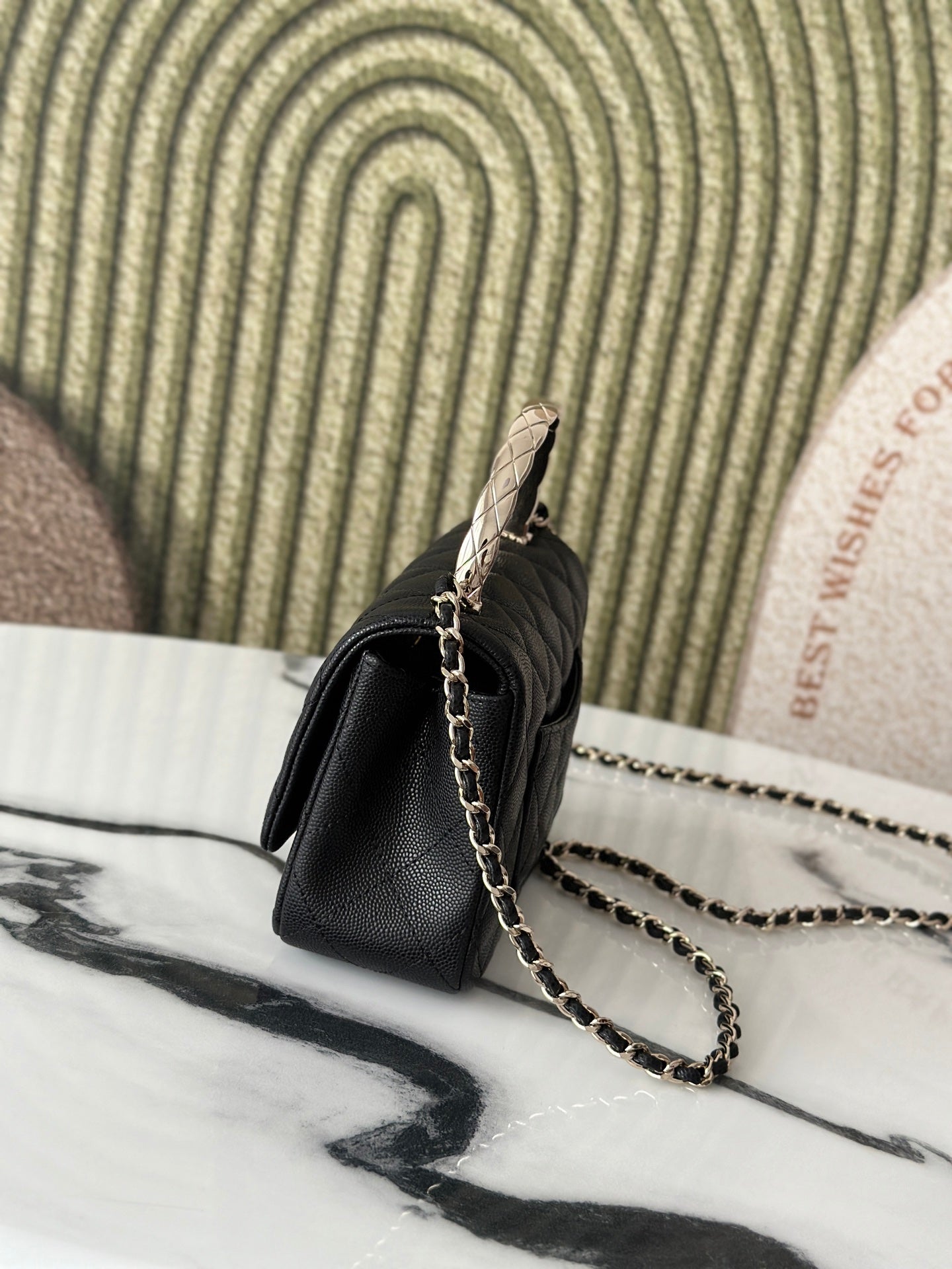 Chanel bag, black quilted leather with chain shoulder strap