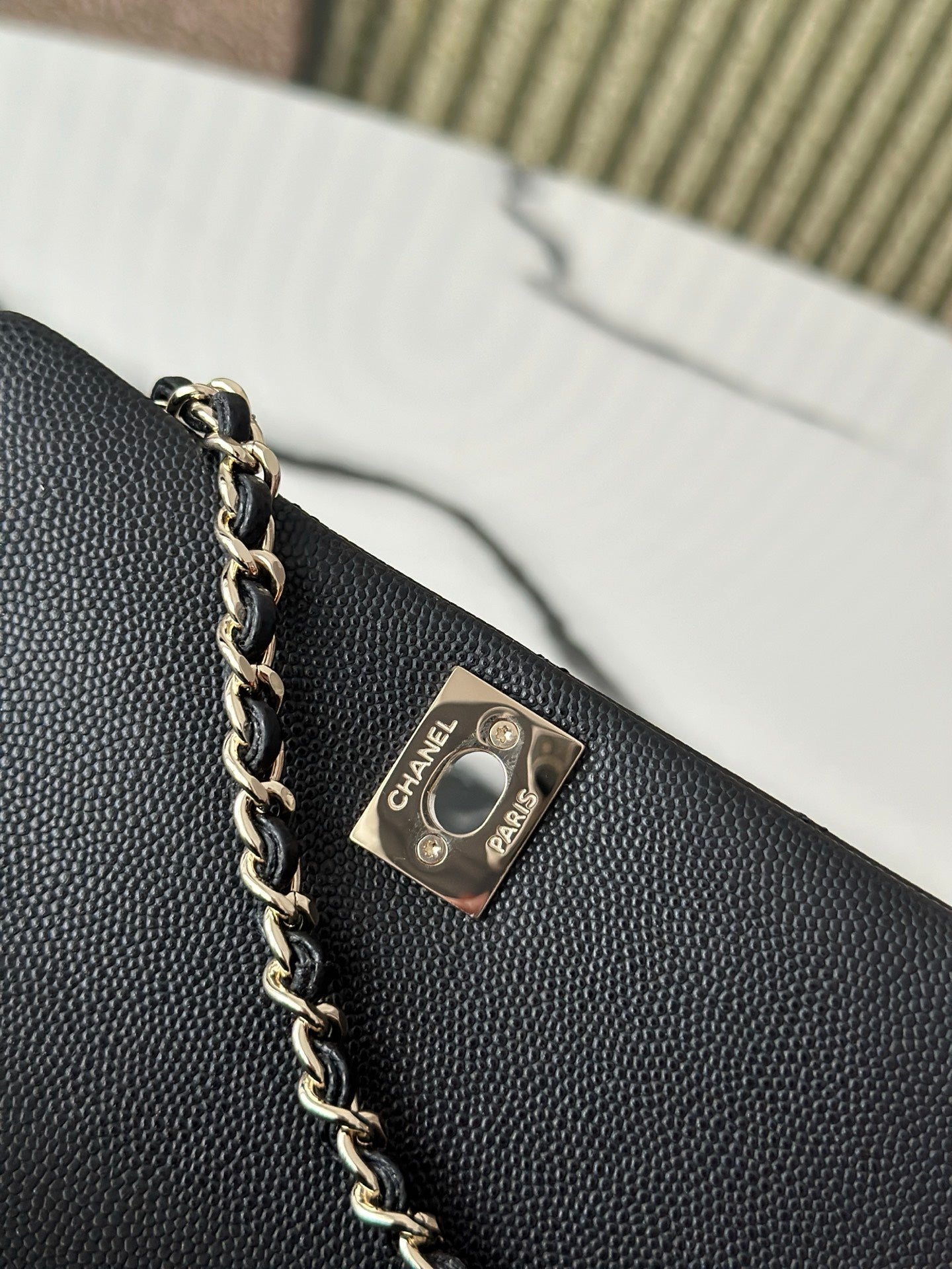 Chanel bag, gold-tone logo plaque and chain on textured black leather