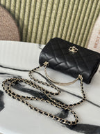 Chanel bag, black quilted leather flap with gold-tone turn-lock