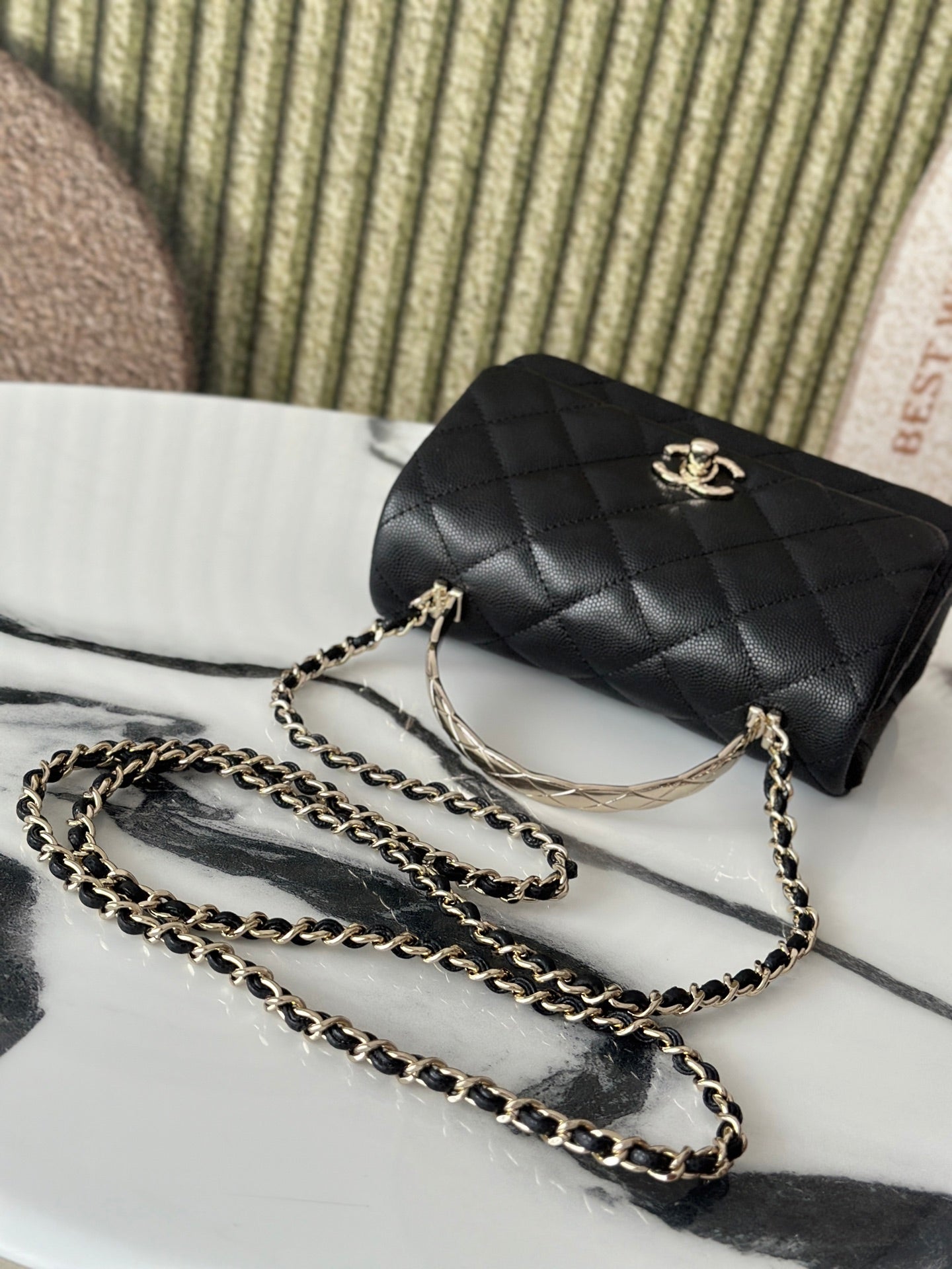 Chanel bag, black quilted leather flap with gold-tone turn-lock