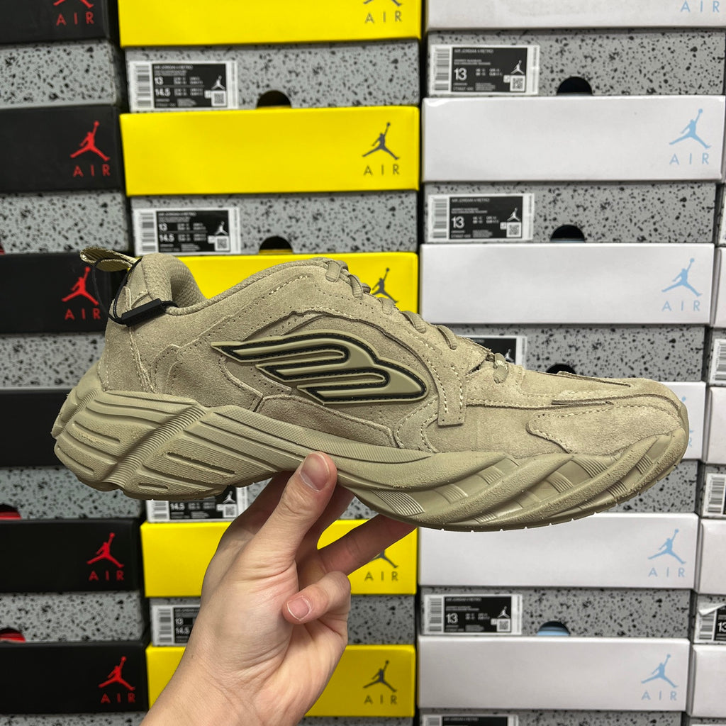 Beige suede lace-up sneaker with side logo and thick cushioned sole