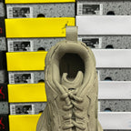 Beige suede sneaker heel collar opening with lace-up close-up