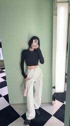 Prada white wide-leg pants with front pockets and belt loops