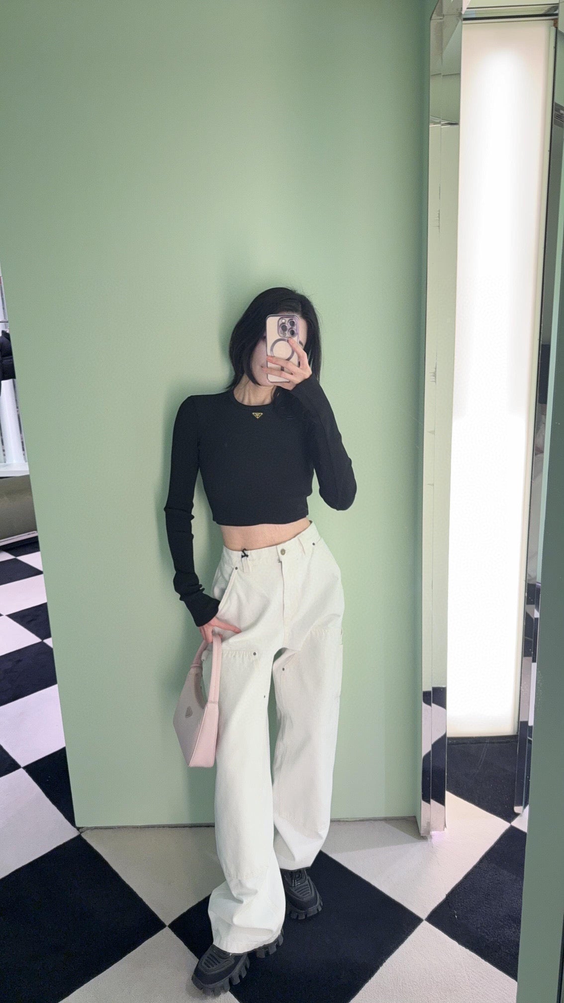 Prada white wide-leg pants with front pockets and belt loops