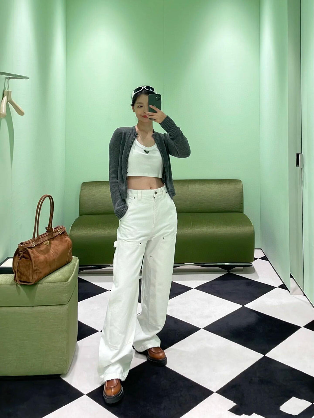 Prada white wide-leg pants with front pockets and button closure