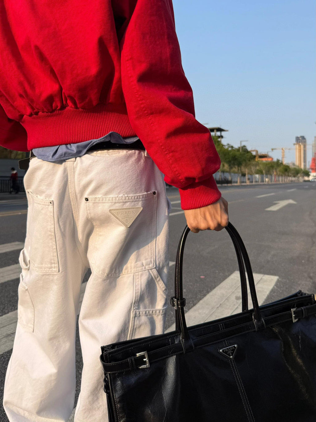 Prada white pants with flap front pockets and belt loops
