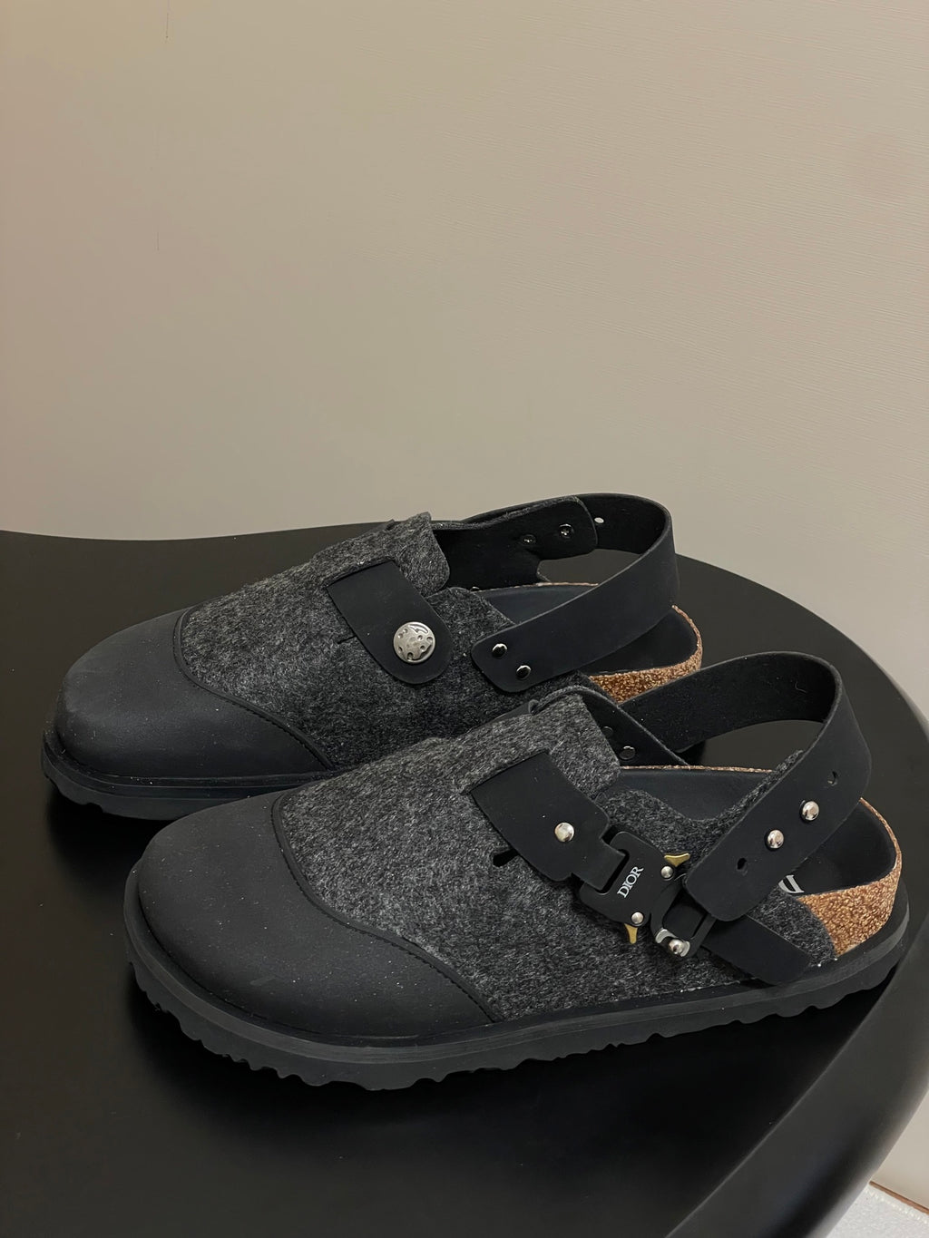 Dior mule sandals, gray textured upper with black cross strap and round metal button