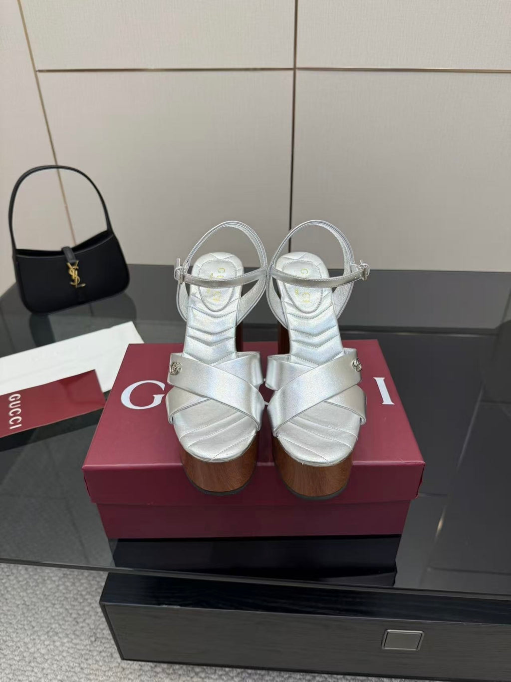 Gucci white leather platform heeled sandals with black mini handbag