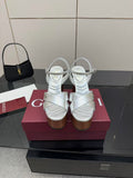 Gucci white leather platform heeled sandals with black mini handbag
