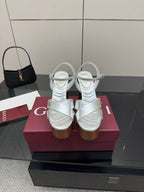Gucci white leather platform heeled sandals with black mini handbag