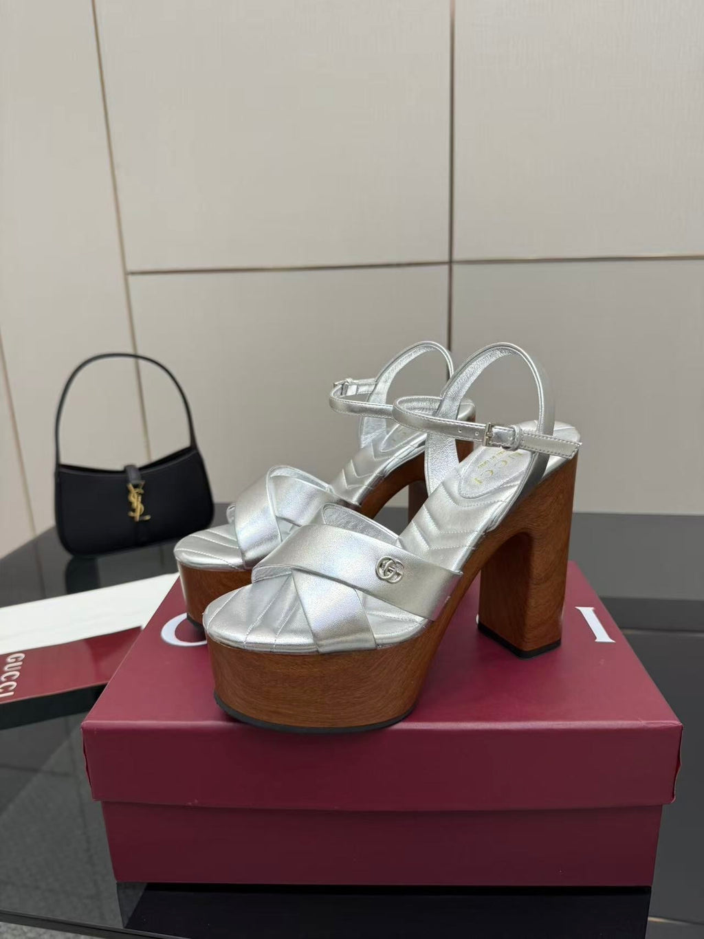 Gucci white leather platform heeled sandals with thick block heels and black mini handbag