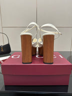 Gucci ladies white platform heeled sandals, back view with ankle straps