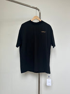 Dark T-shirt with small Off-White™ logo on chest