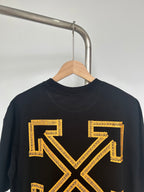 Black Off-White T-shirt closeup with yellow arrow X graphic