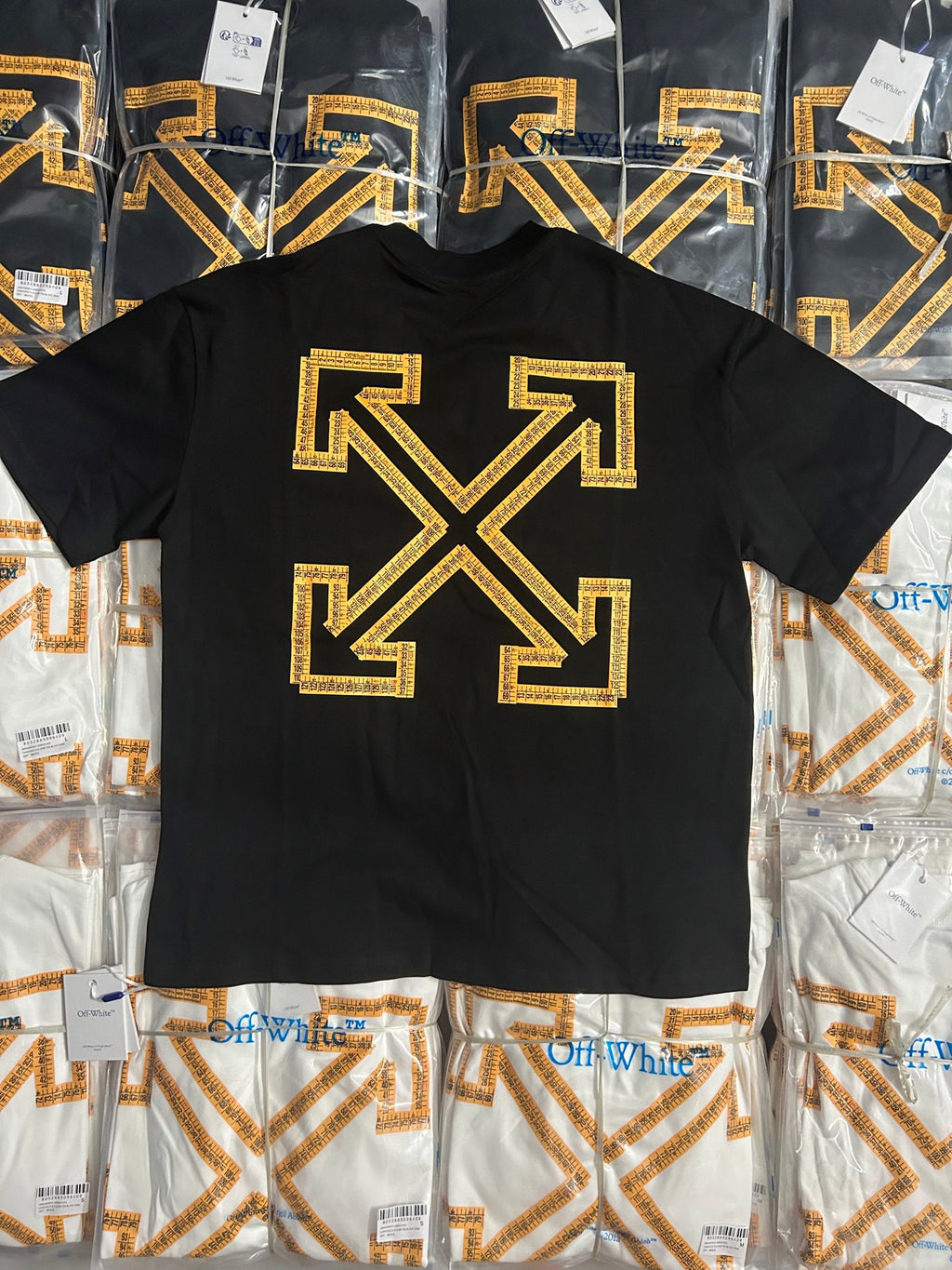 Off-White T-shirt with large gold arrow X graphic on dark front