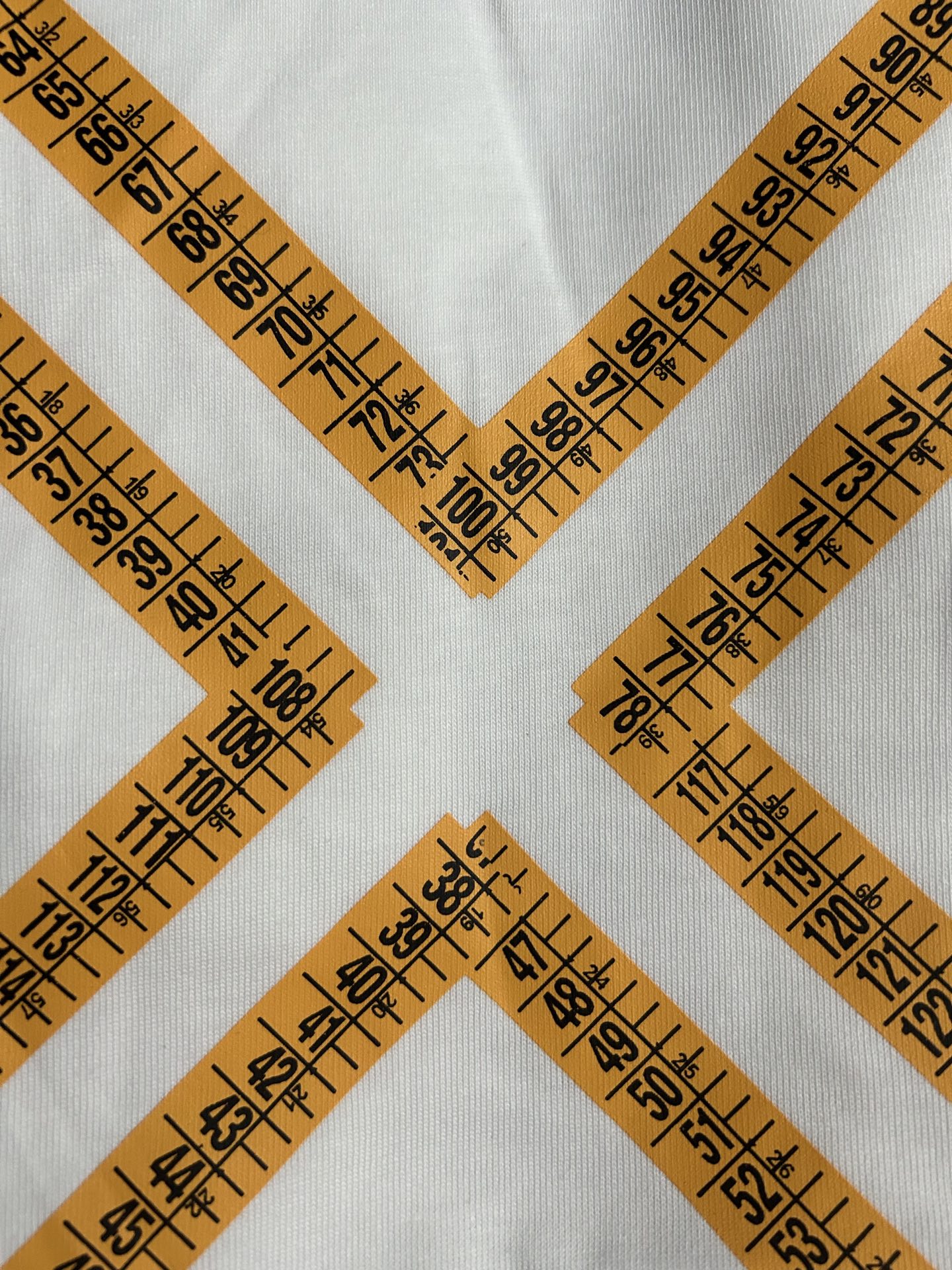 Off-White off-white T-shirt close-up of orange measurement-style X marks